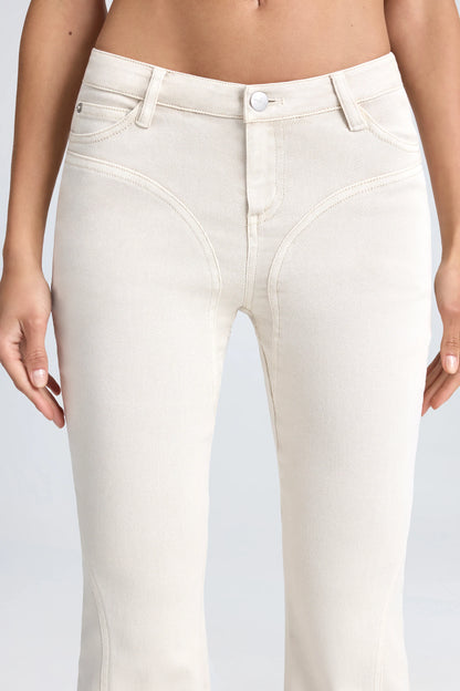 Mid-Rise Flared Jeans in Ecru