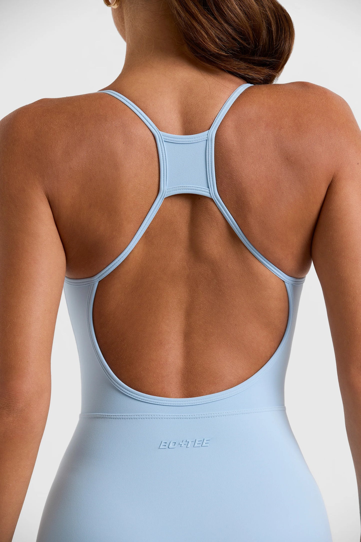 Scoop Neckline Open Back Unitard in Ice Blue