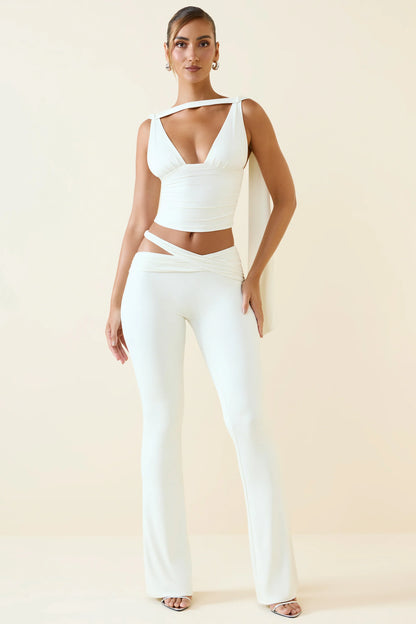 Cut-Out Mid-Rise Flared Trousers in Vanilla