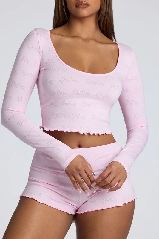 Long Sleeve Scoop Neck Pointelle Crop Top in Baby Pink