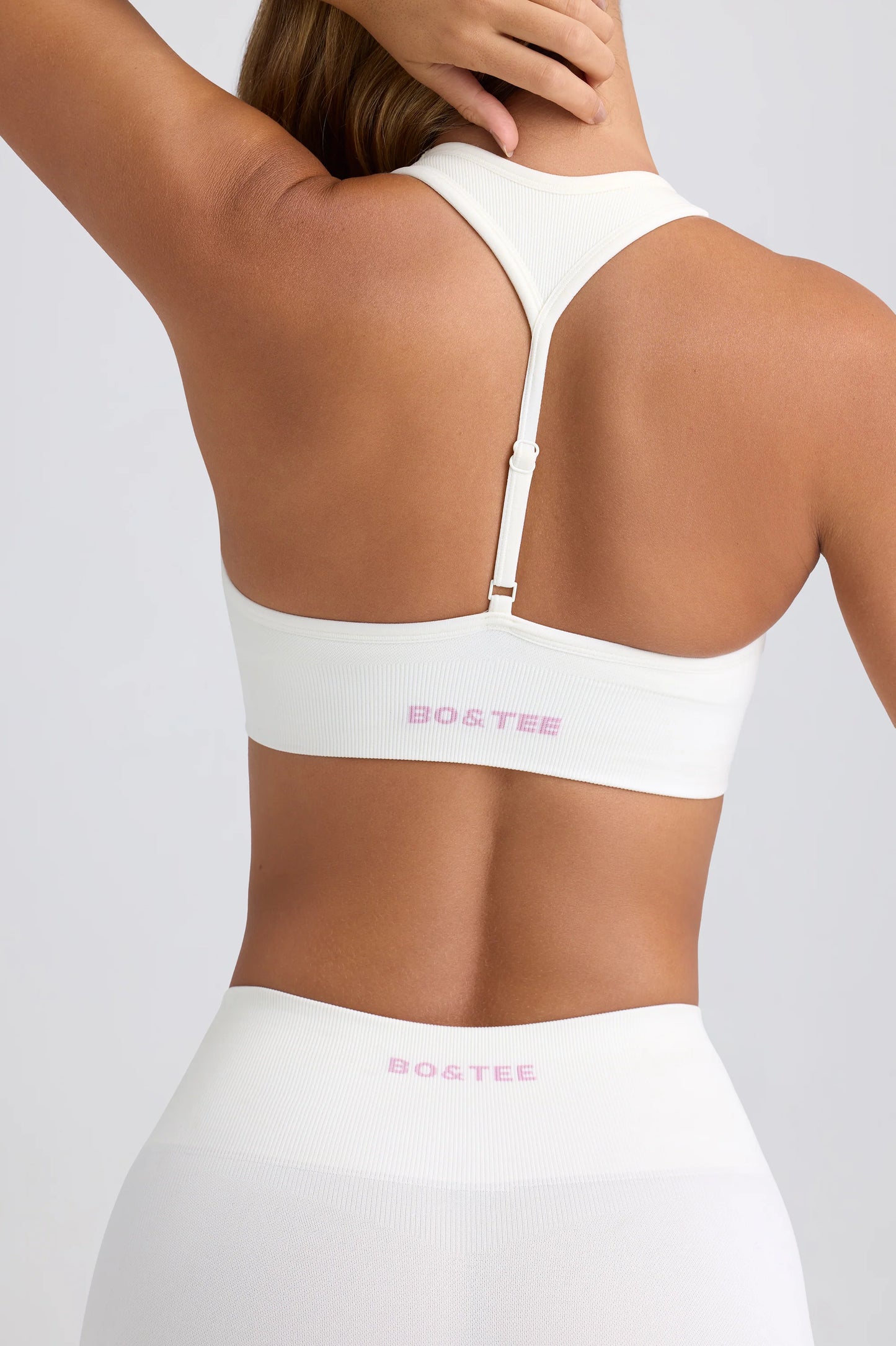 Super Sculpt Seamless T-Back Sports Bra in Eggshell