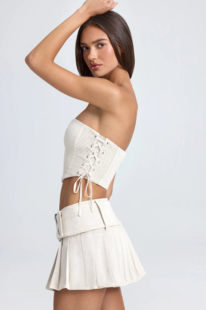 Belted Pleated Low-Rise Micro Mini Skirt in Ecru