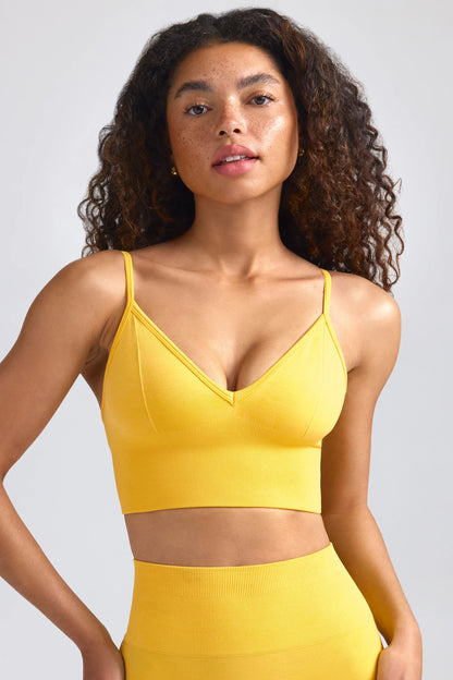 Define Luxe V-Neck Sports Bra in Golden Yellow