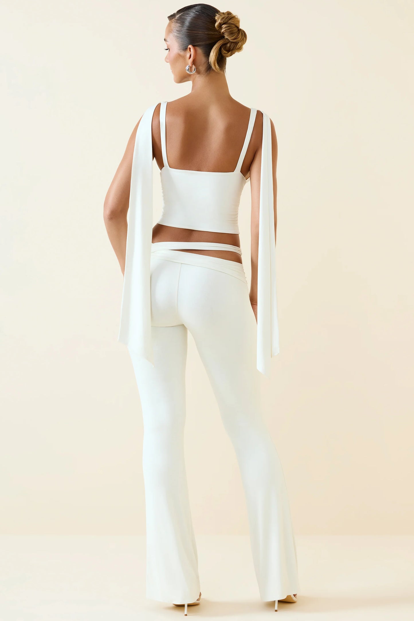 Cut-Out Mid-Rise Flared Trousers in Vanilla