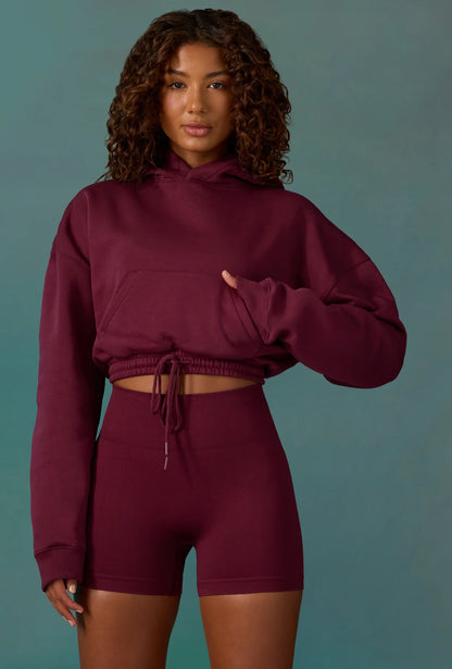 Cropped Drawstring Hooded Sweatshirt in Plum