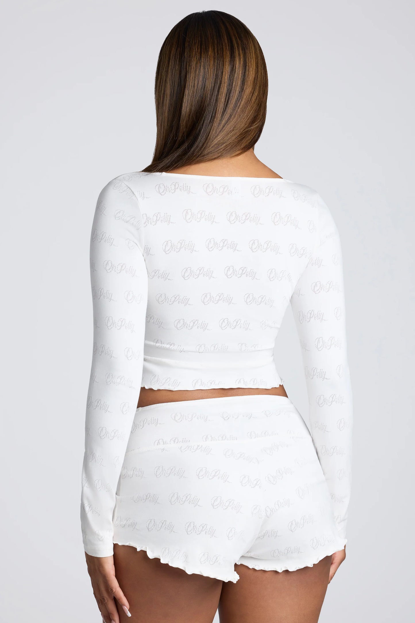 Long Sleeve Scoop Neck Pointelle Crop Top in White