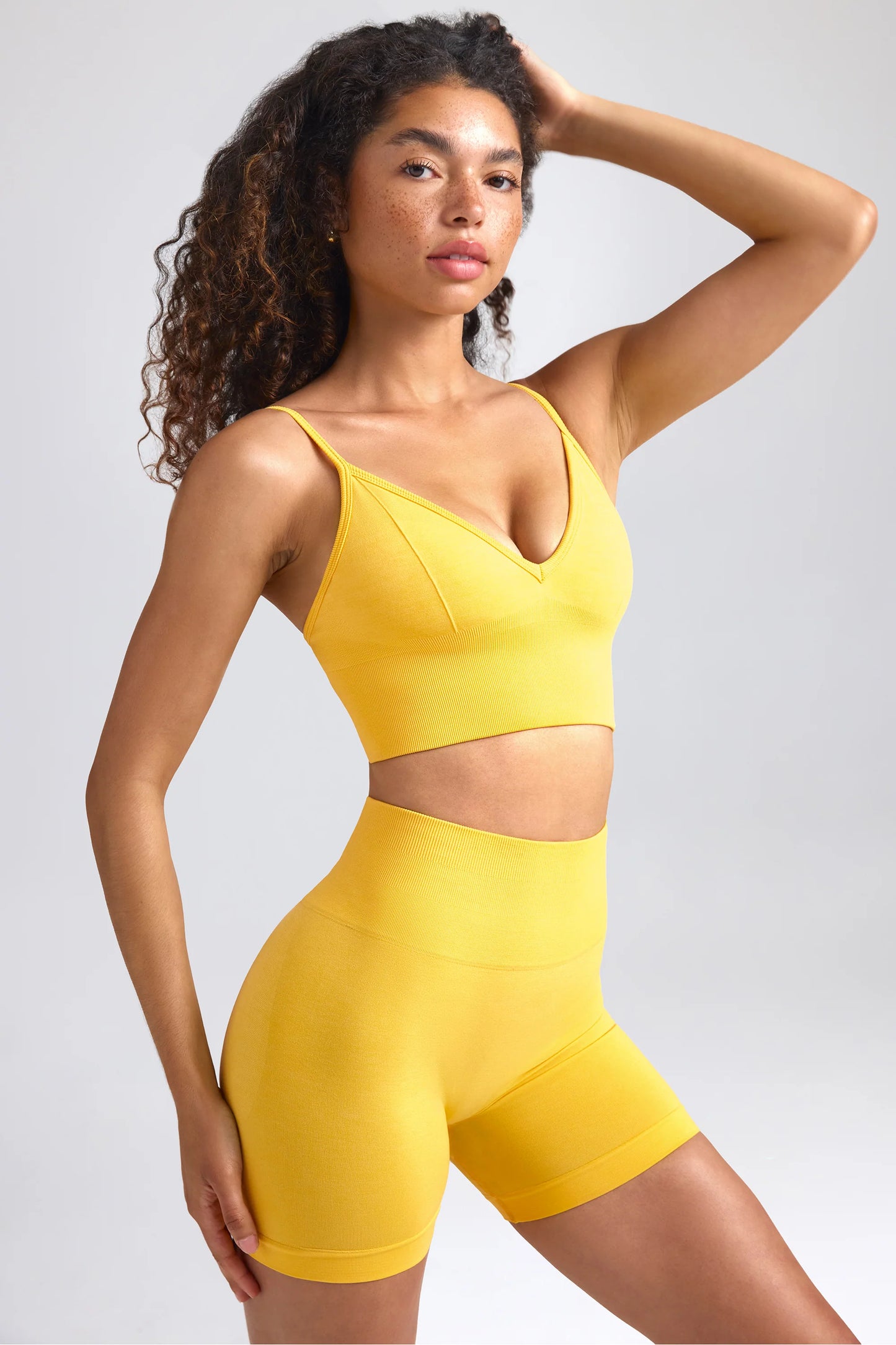 Define Luxe V-Neck Sports Bra in Golden Yellow