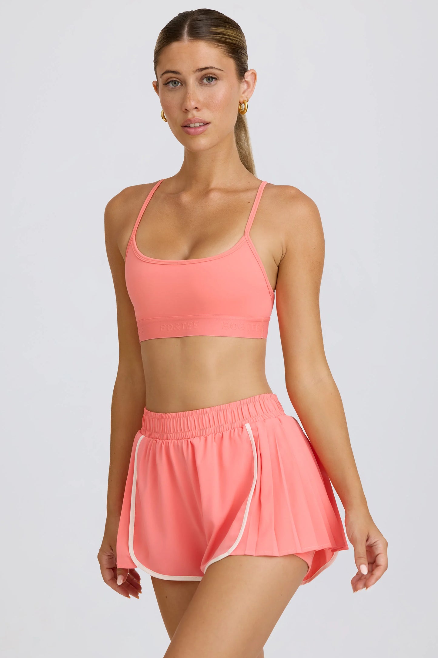 Pleated Mini Shorts in Coral