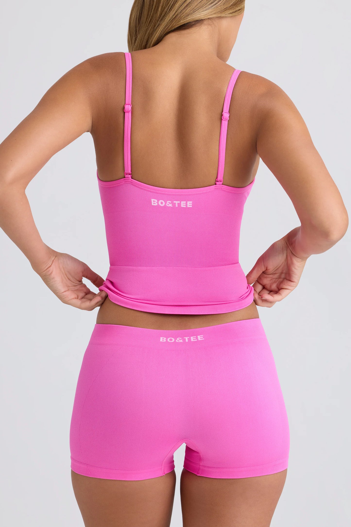 Super Sculpt Seamless Mid-Rise Mini Shorts in Sugar Pink