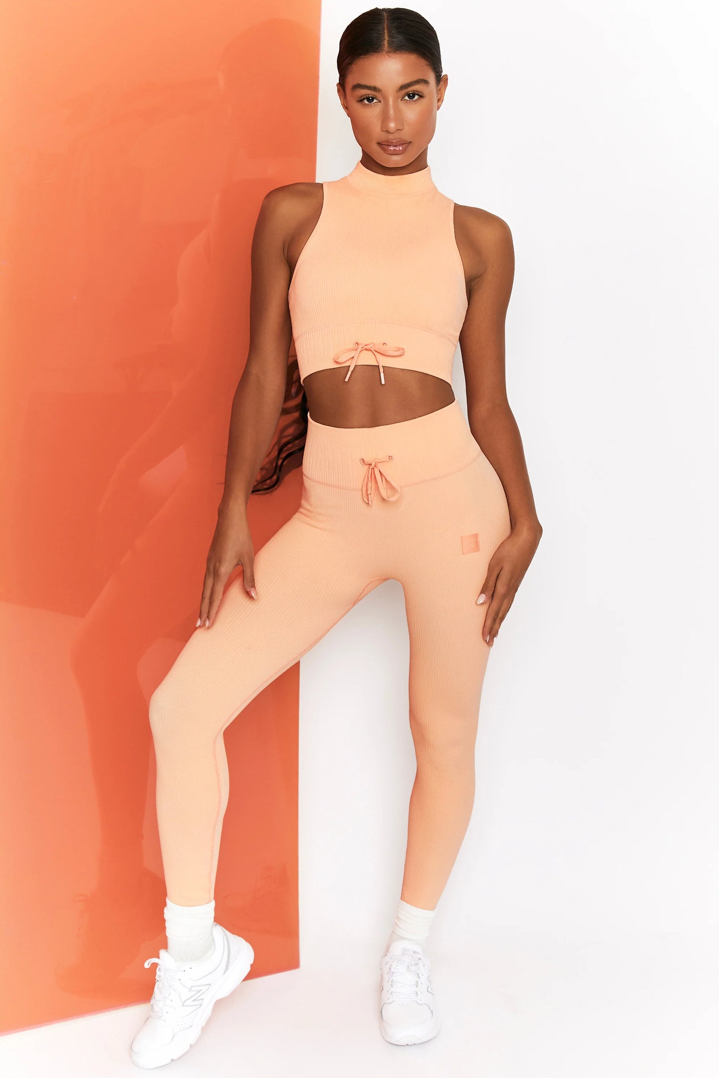 Miles Ahead Ribbed High Neck Crop Top in Peach