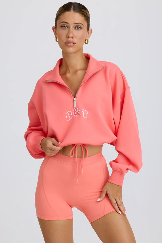 Quarter-Zip Cropped Sweatshirt in Coral