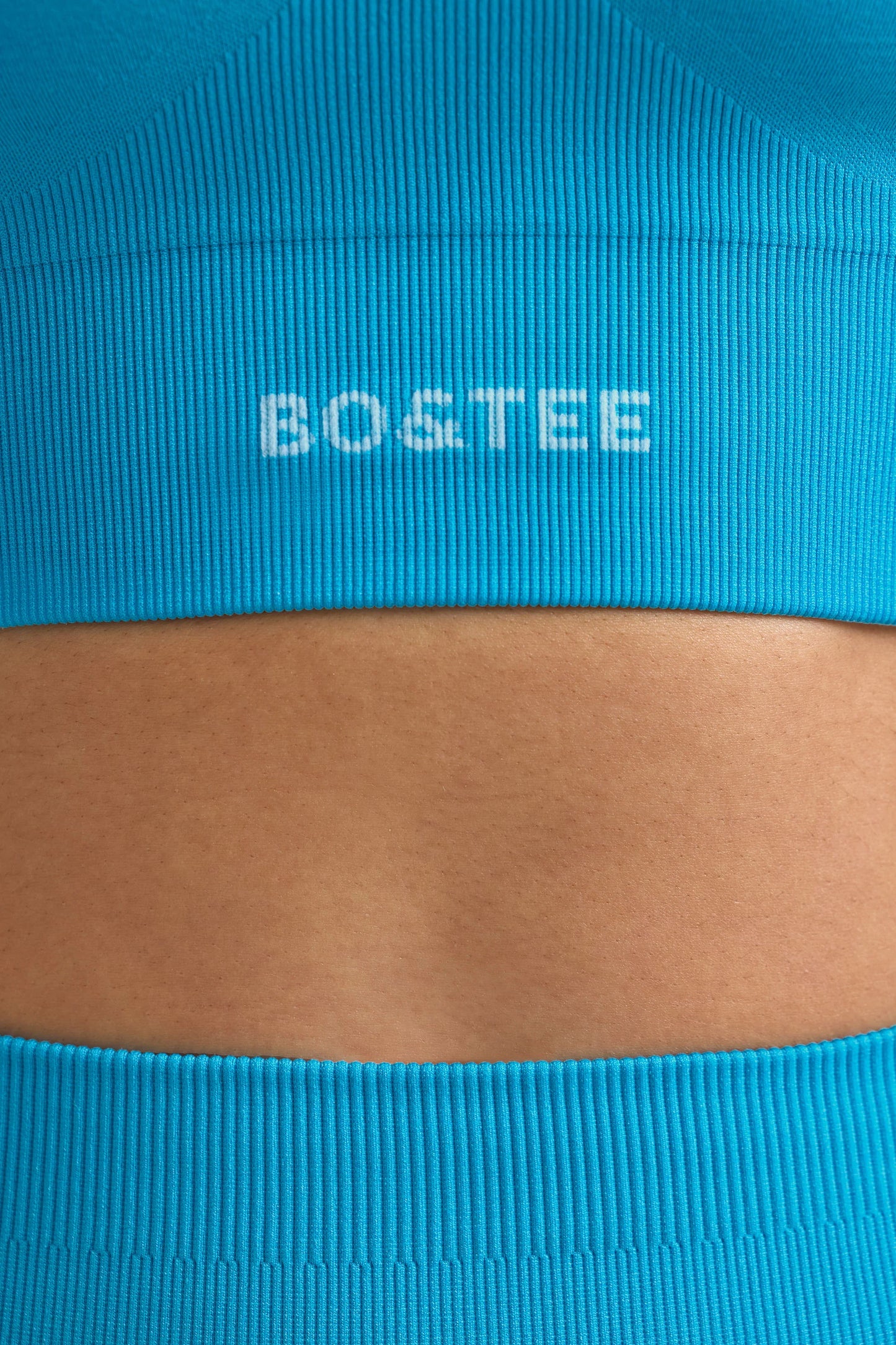 Define Luxe Halterneck Sports Bra in Turquoise Blue