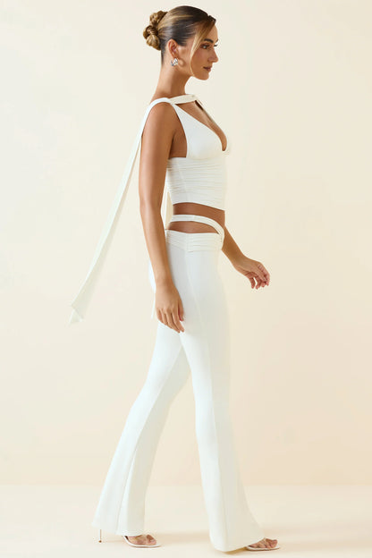 Cut-Out Mid-Rise Flared Trousers in Vanilla