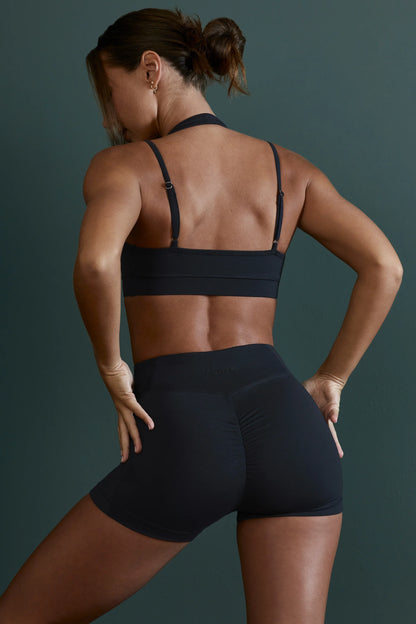 Plunge Neck Wrap Over Sports Bra in Black