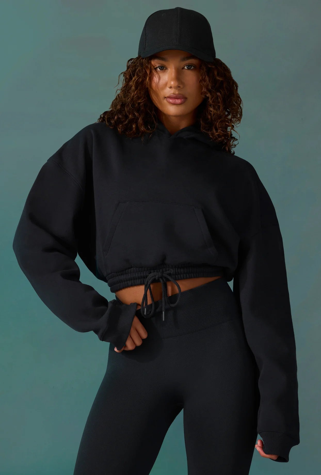 Cropped Drawstring Hooded Sweatshirt in Black