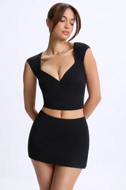 Mid-Rise Micro Mini Skirt in Black